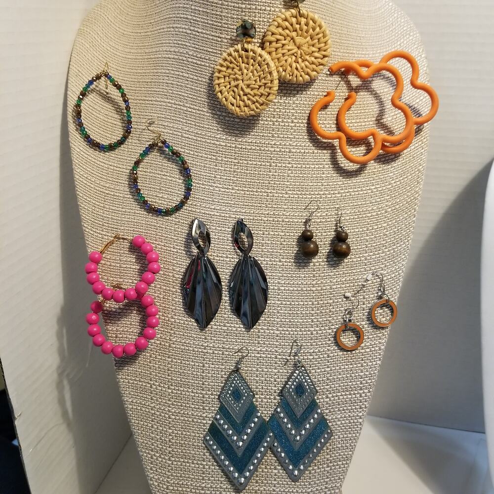 Eight pairs of dangle pierced earrings silver tone and gold tone various colors